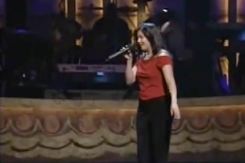 image of Elaine performing at the Apollo Theatre